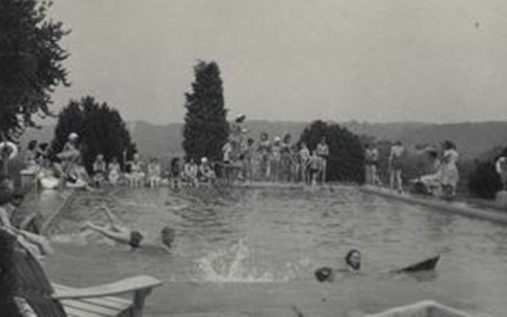 Black and white photo of an outdoor pool