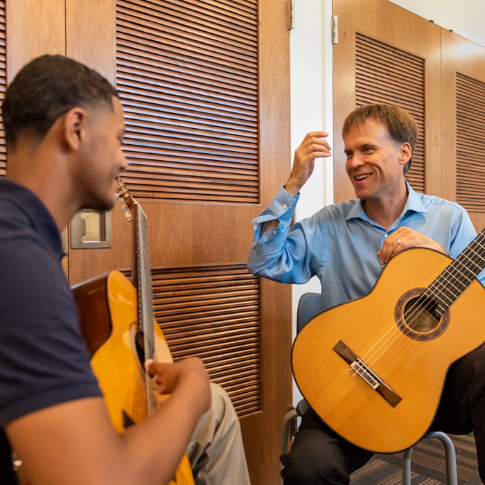 Erik Mann teaching guitar