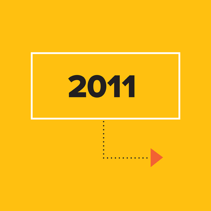 2011 in black on yellow background inside white box with arrow