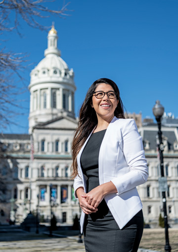 Catalina Rodriguez Lima in front of Baltimore City Hall