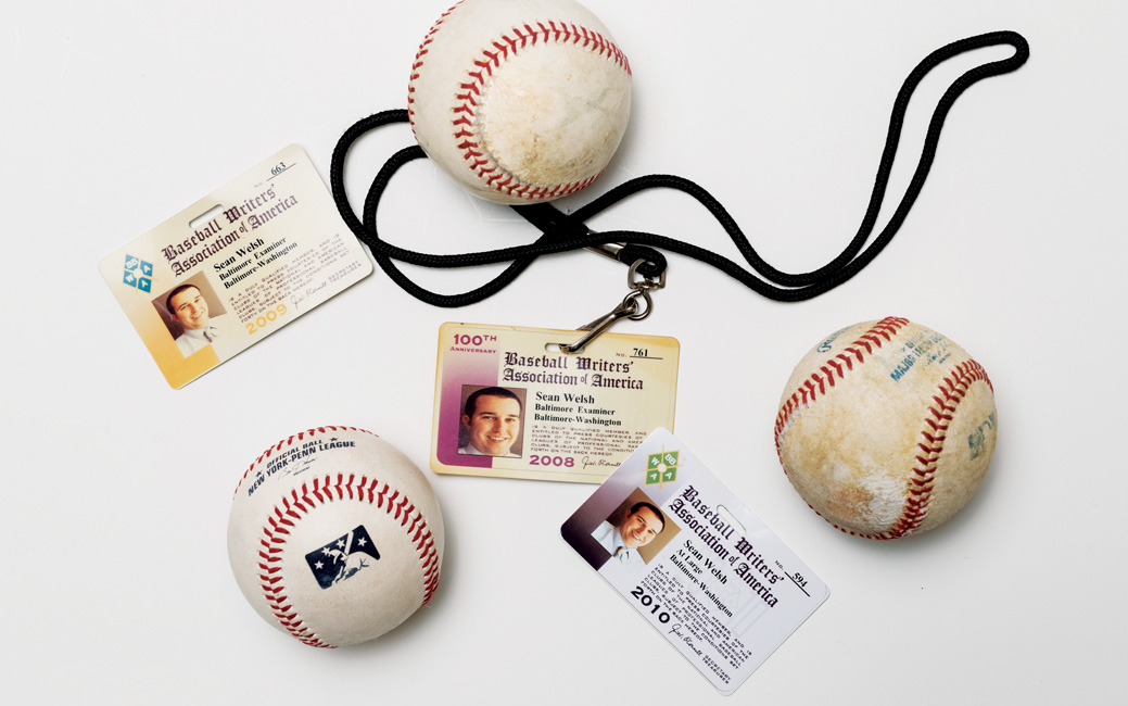 Sean Welsh's press credentials and baseballs