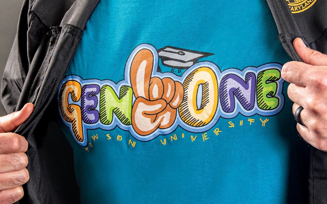 photo of a blue T-shirt that says GenOne