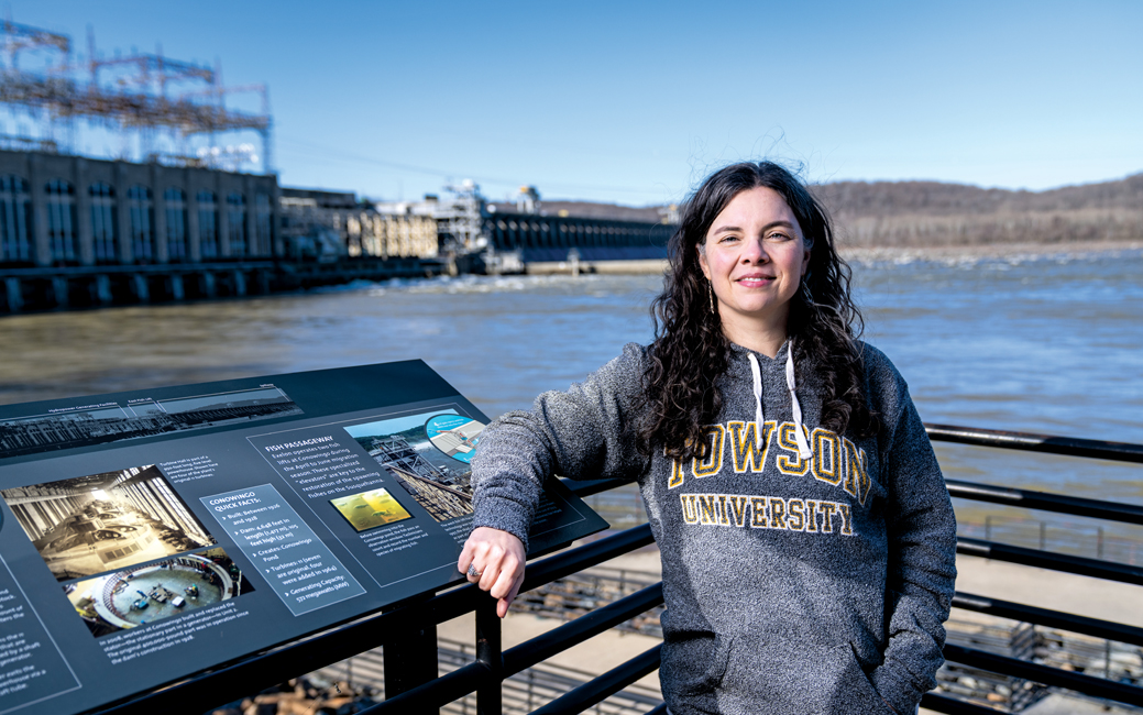 Pam Lottero-Perdue standing with the Conowingo Dam in the background