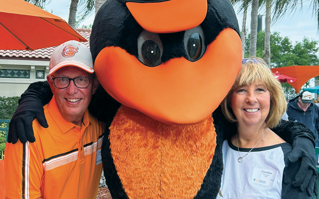 TU alumni Joseph Wesolowski ’70 and Cynthia Stewart ’08 with the Oriole Bird