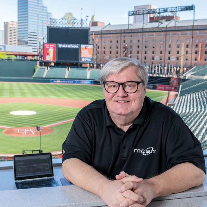 Steve Melewski ’83 in a baseball stadium press box
