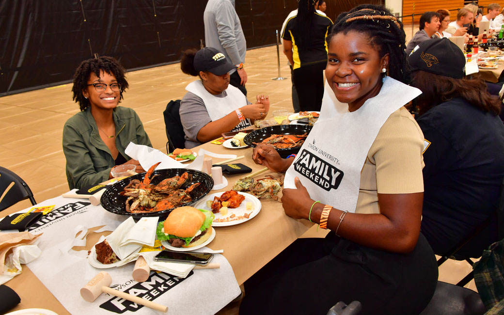 Students enjoying the Crab Feast during Family Weekend
