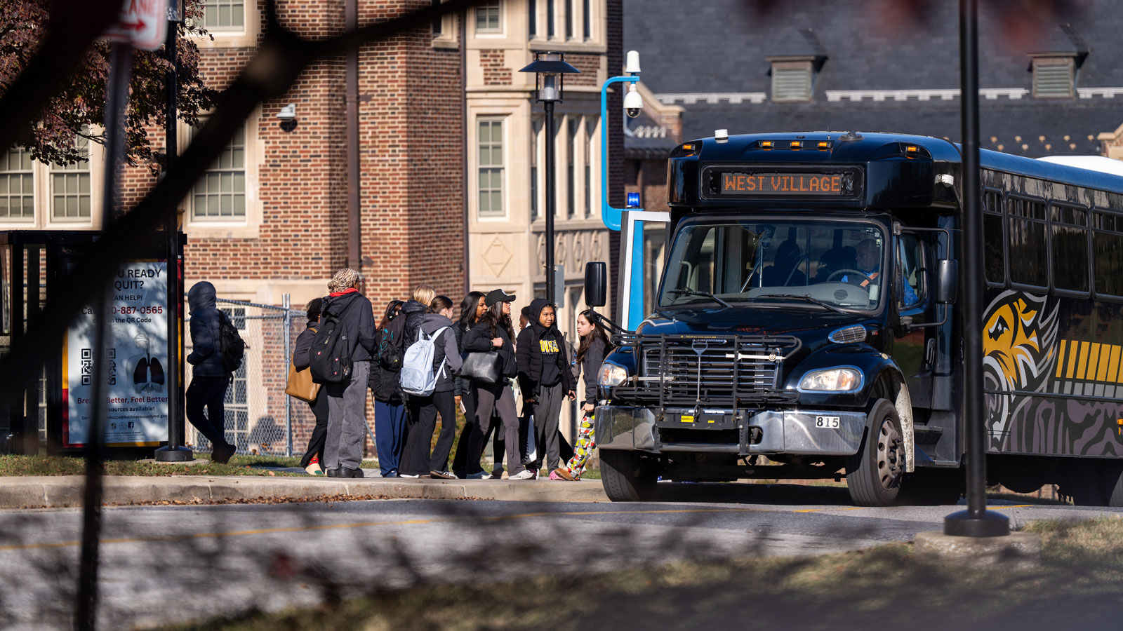Students taking a shuttle, that's available to all Towson University students