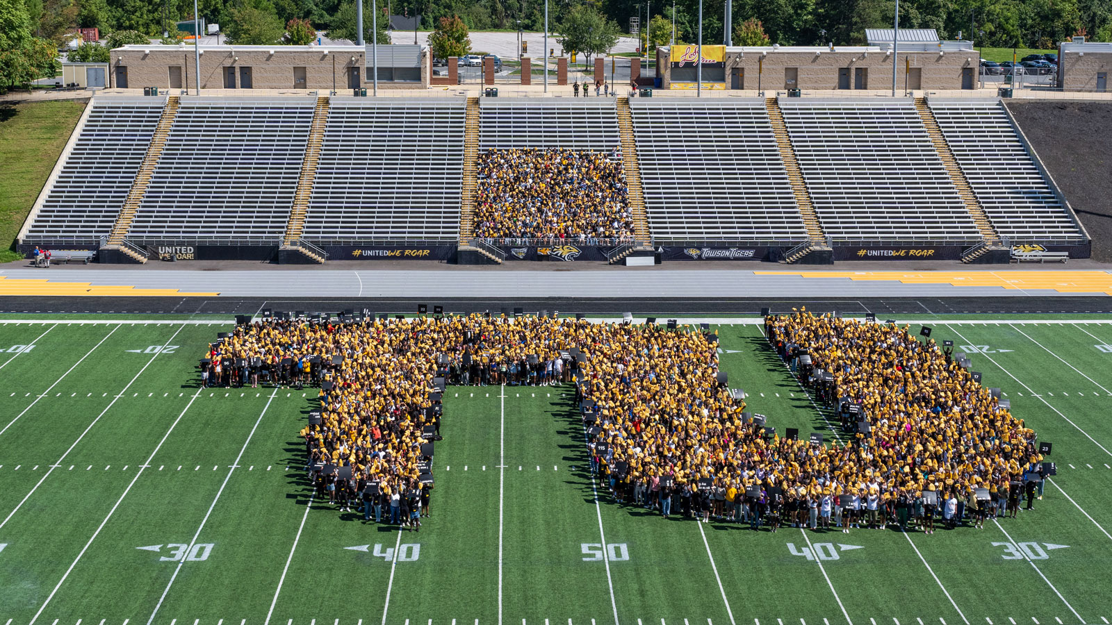 Last year's new students make a version of the Towson University logo