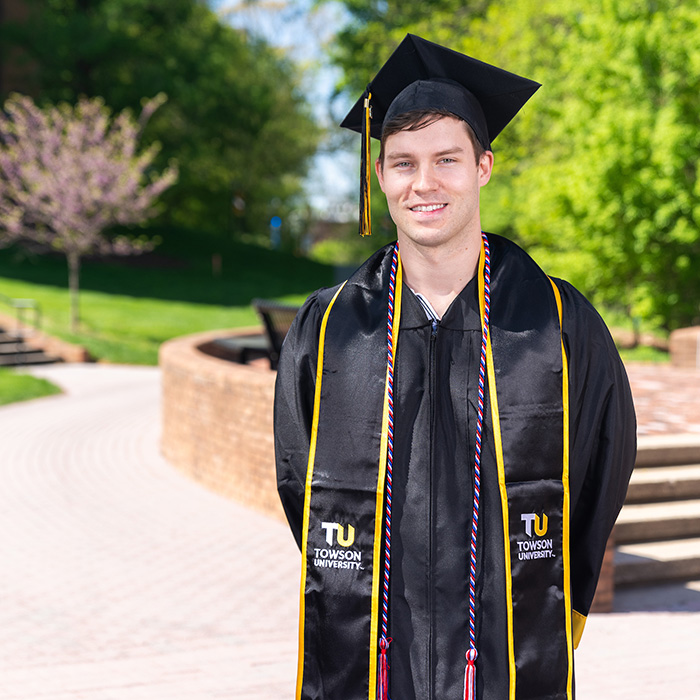 GIF of student moving tassel outdoors