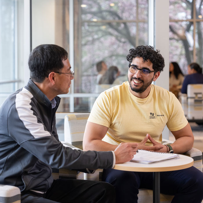 Students in the Marketing Intelligence program chat