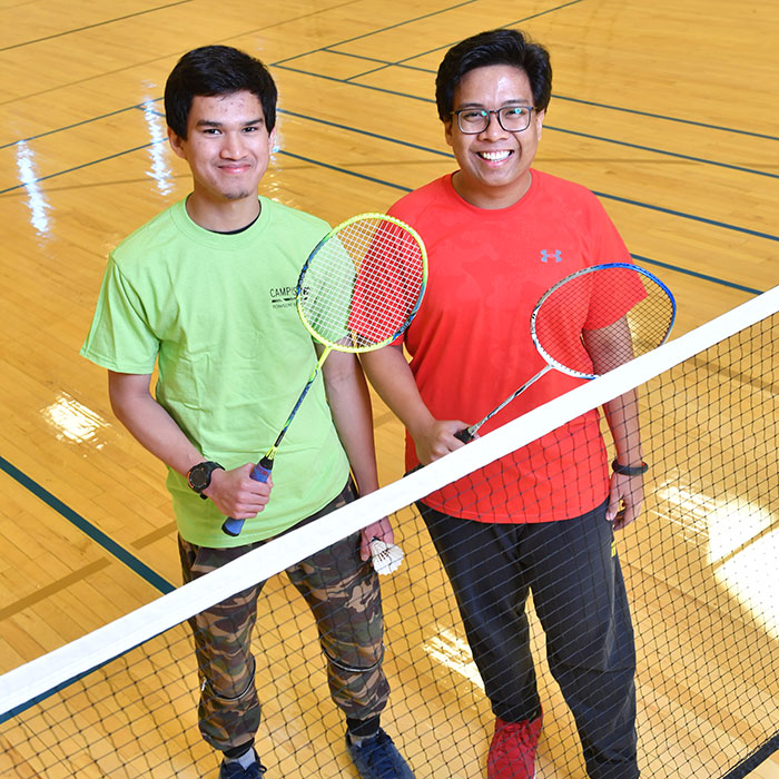 Aizad and Azri Kamal in Burdick gym