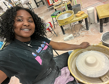 Alexis at the pottery wheel