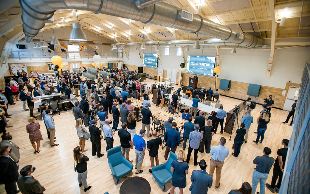 View of coworking space from above filled with people