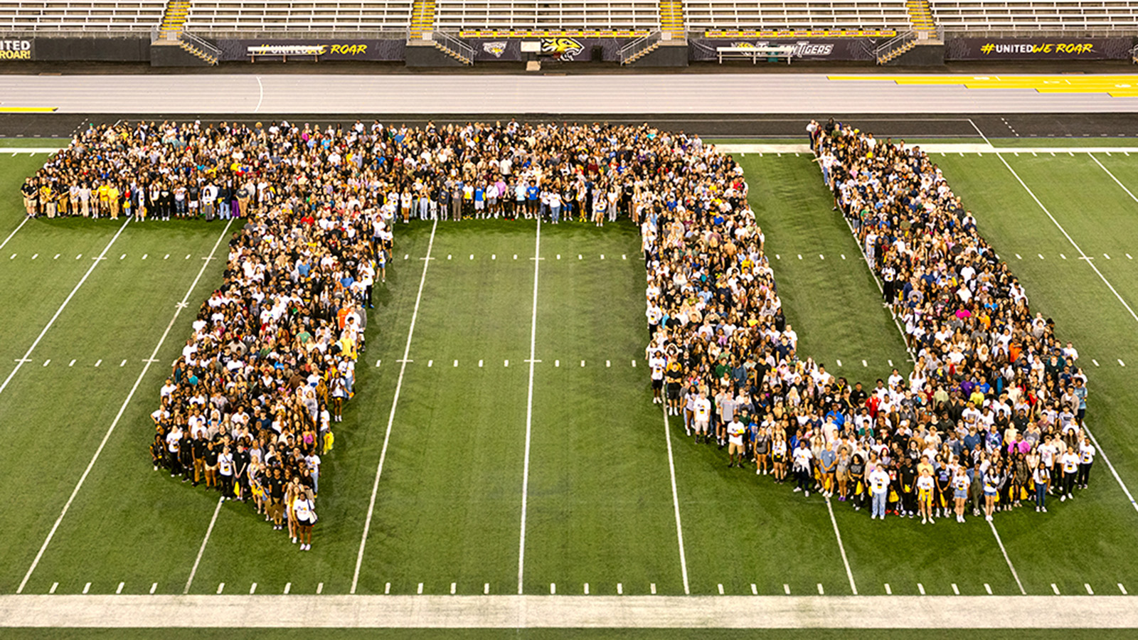 Alumni spell out TU on the university's football field