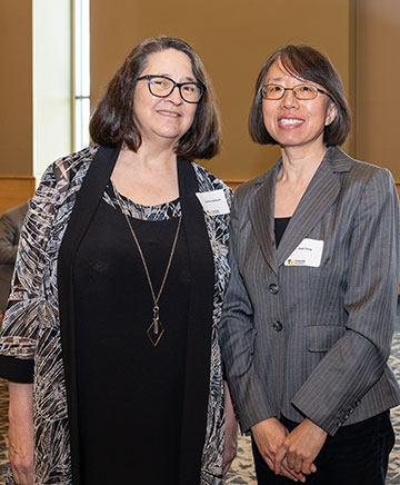 Connie Anderson and Heidi Feng