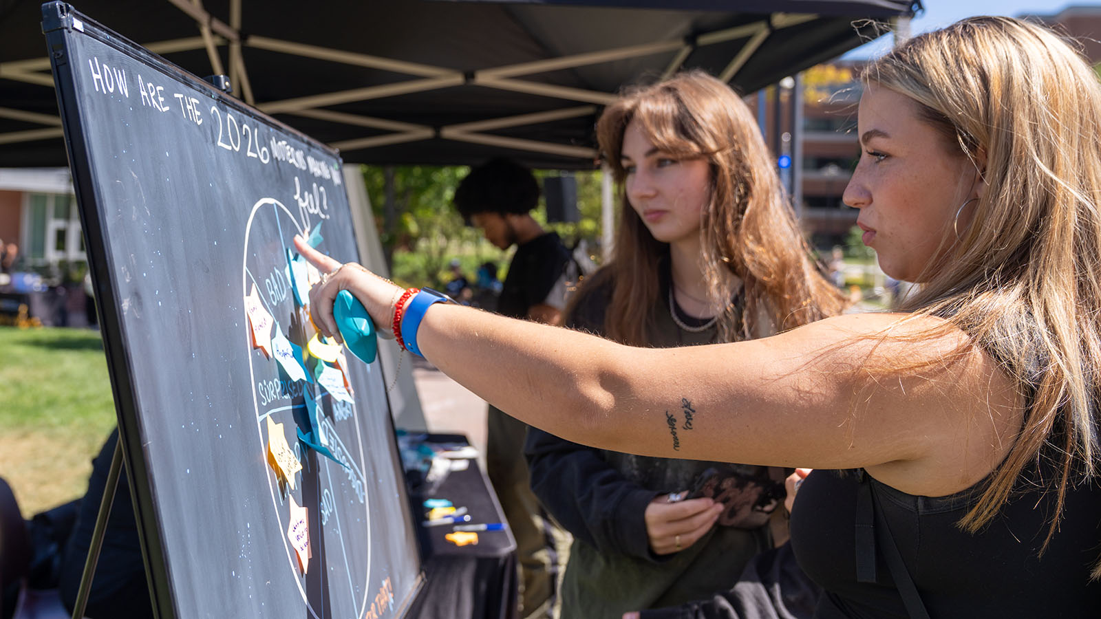 Person pointing to a map