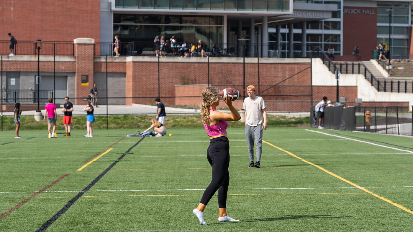 Person throwing football
