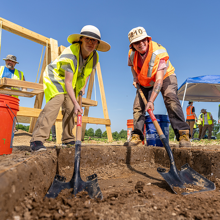 archaeology students workin in a dig