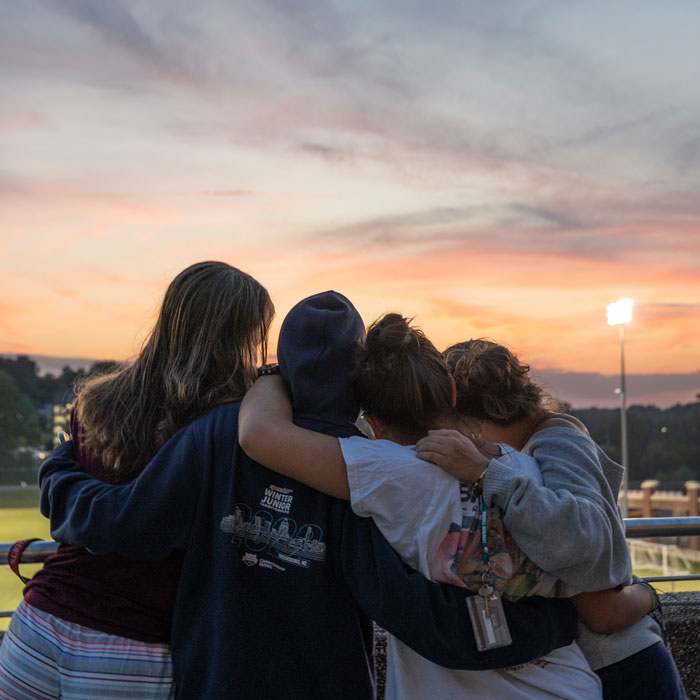 Students looking over the Union practice field