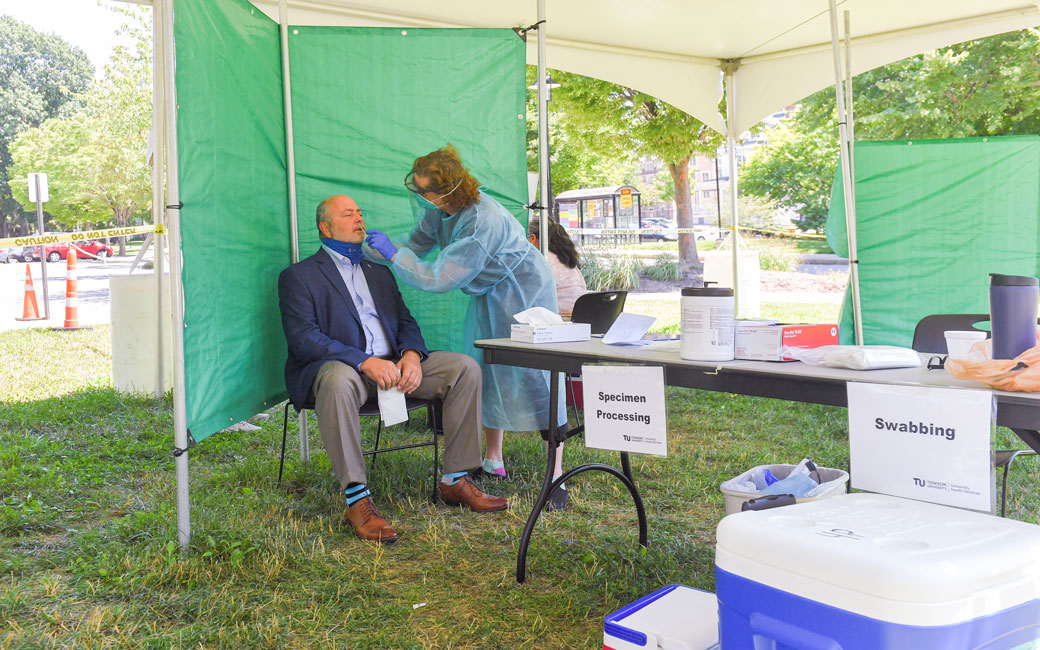 A TU staff member gets tested for COVID-19