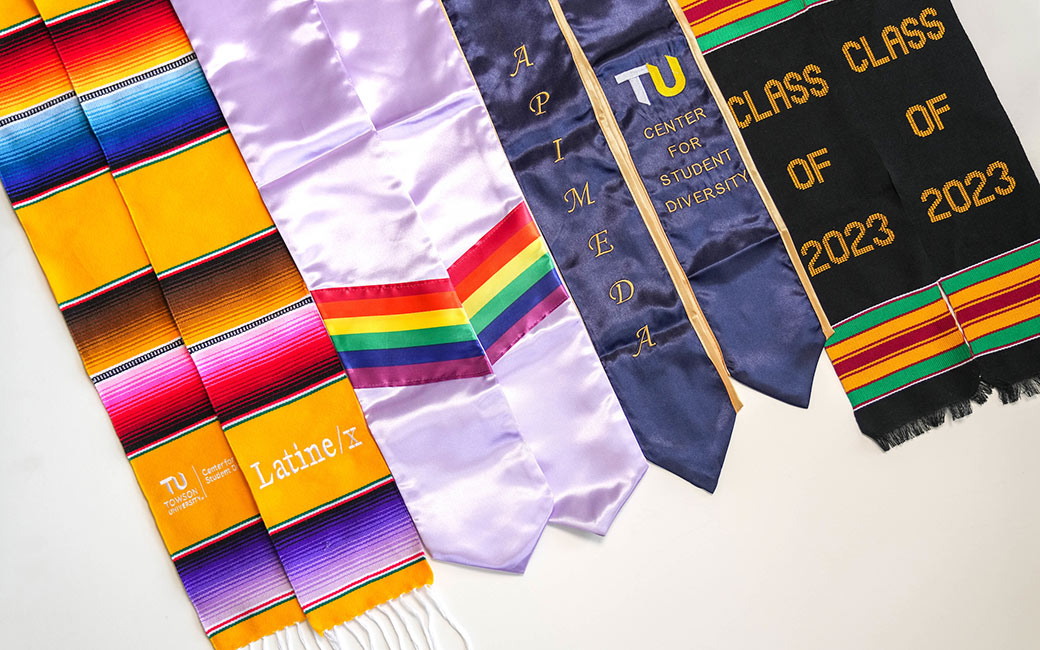 Four cultural stoles laying on white background