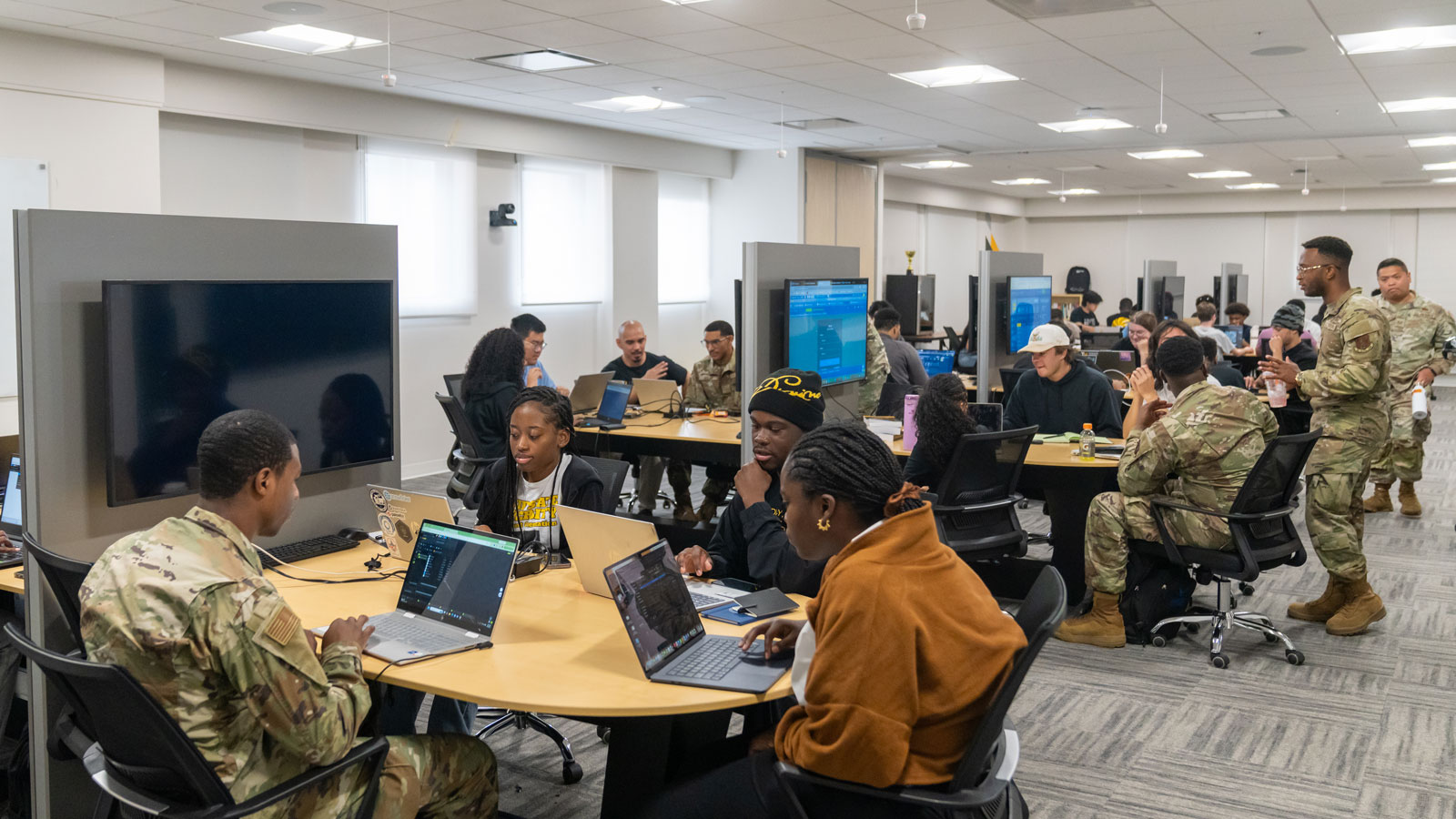 Members of the Maryland Air Force National Guard join college students in the Cyber Capture the Flag competition