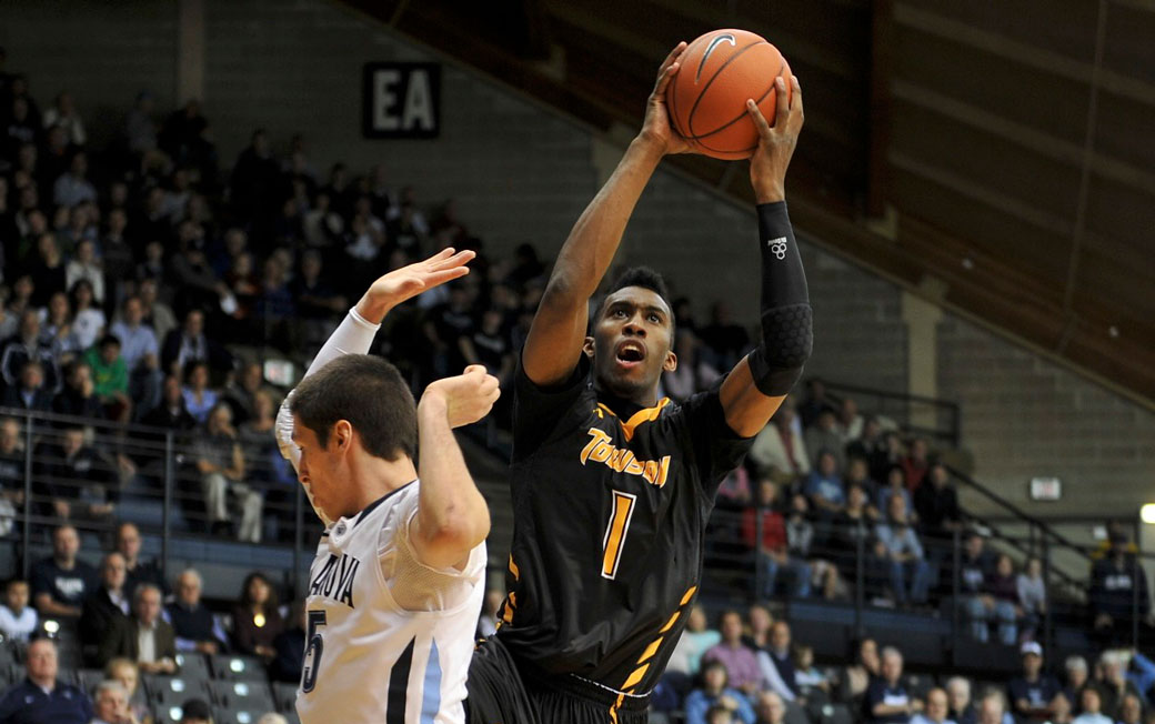 Marcus Damas '14 used to score points for the Towson University men's basketball team. Now he's scoring deals with his new creative marketing agency, Fueled by Culture. 