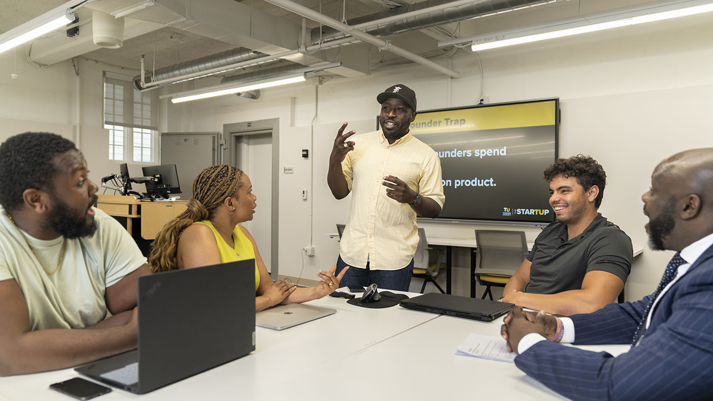 Daniel Kawah mentoring group of founders
