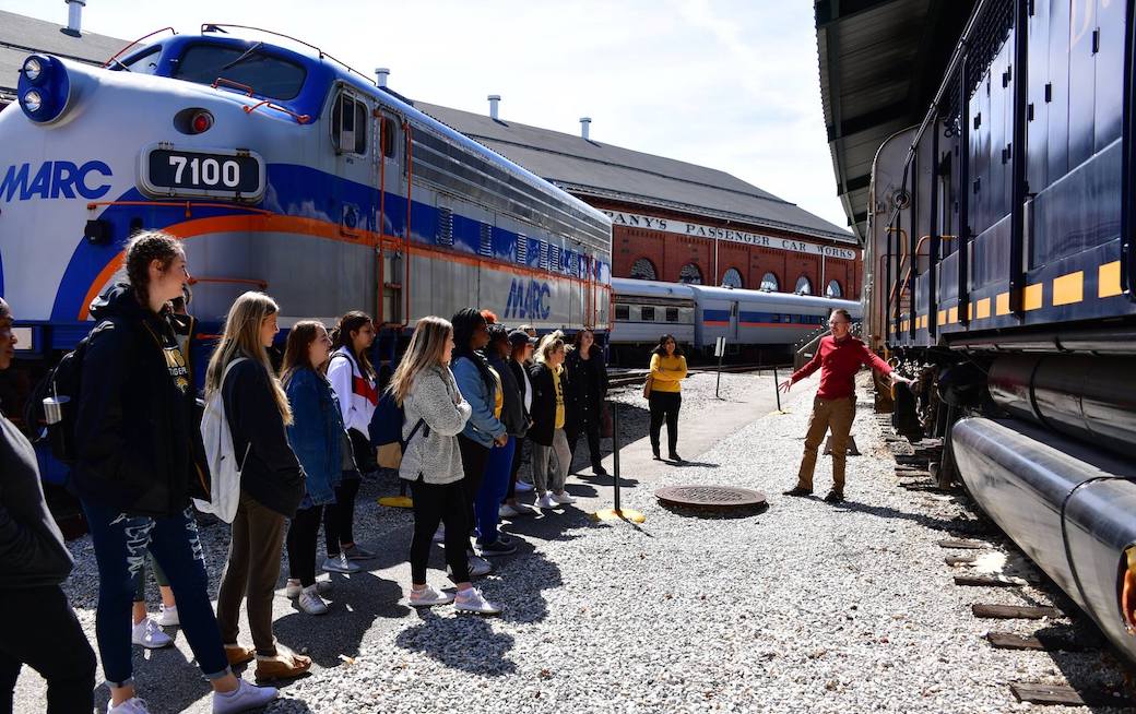 Students in front of a train