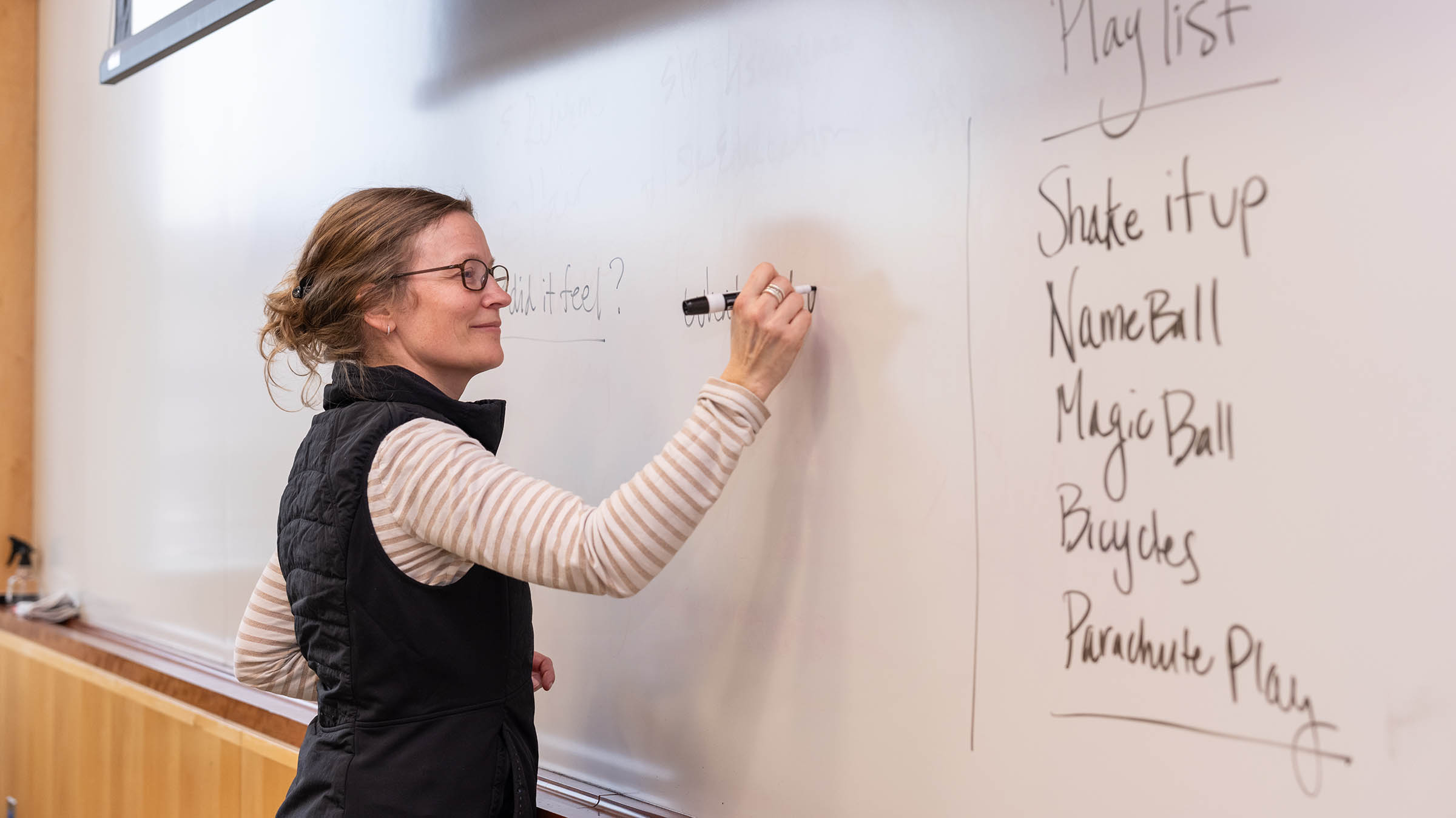 Emily Margolis drawing on whiteboard