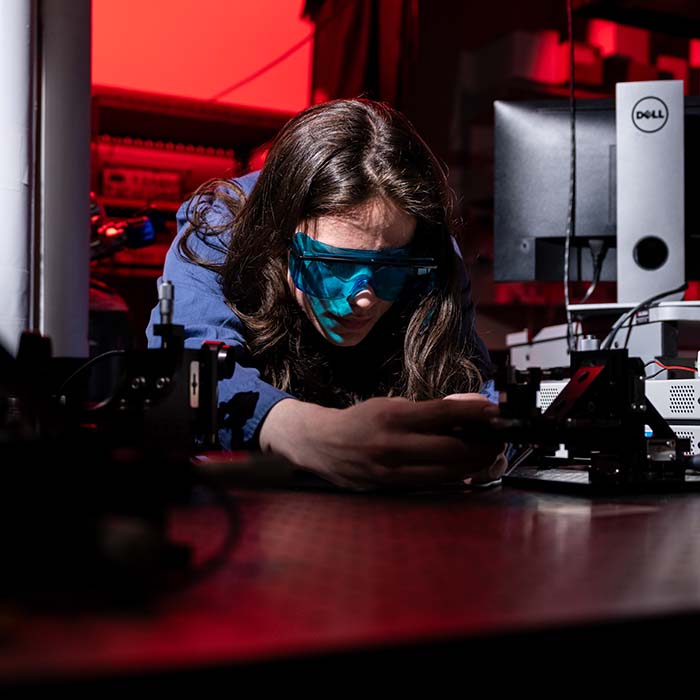 Student working with machine