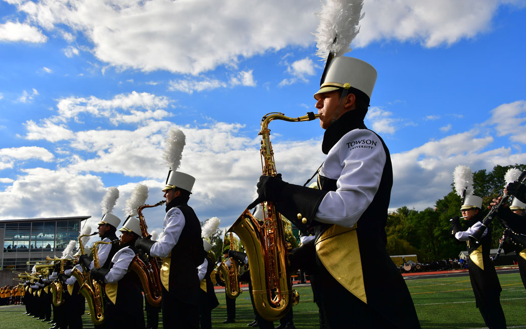 Members of Towson University Marching Band perform at halftime
