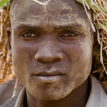 Close-up of park ranger face with mud