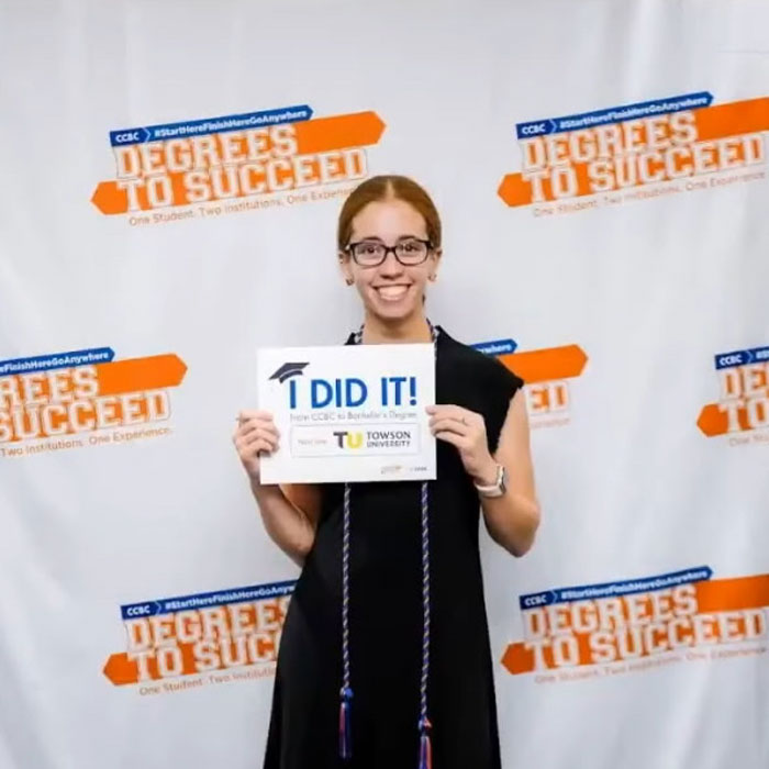 Holly holds her certificate of completion for the Degrees to Succeed partnership