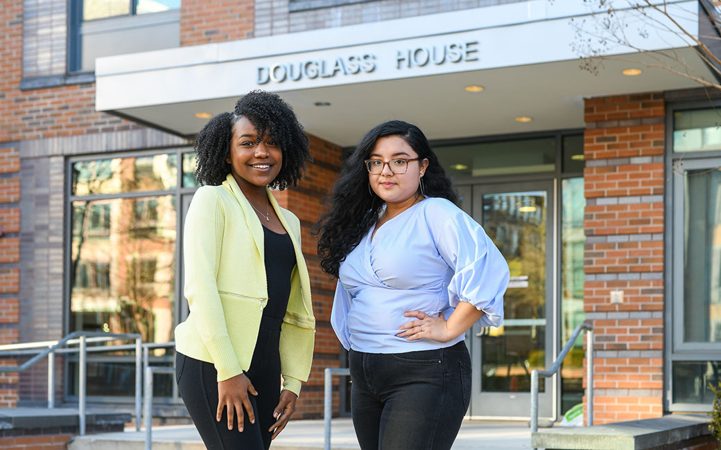 Honorables of Color leadership stands outside Douglass House