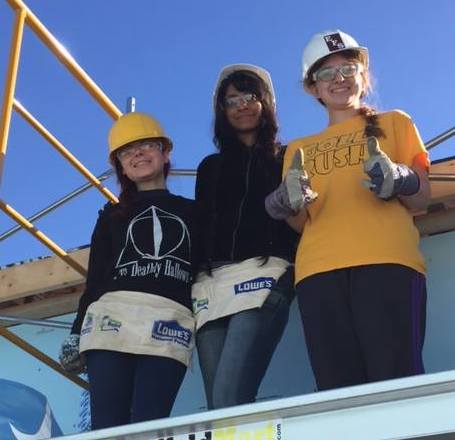 Three TU students at build site