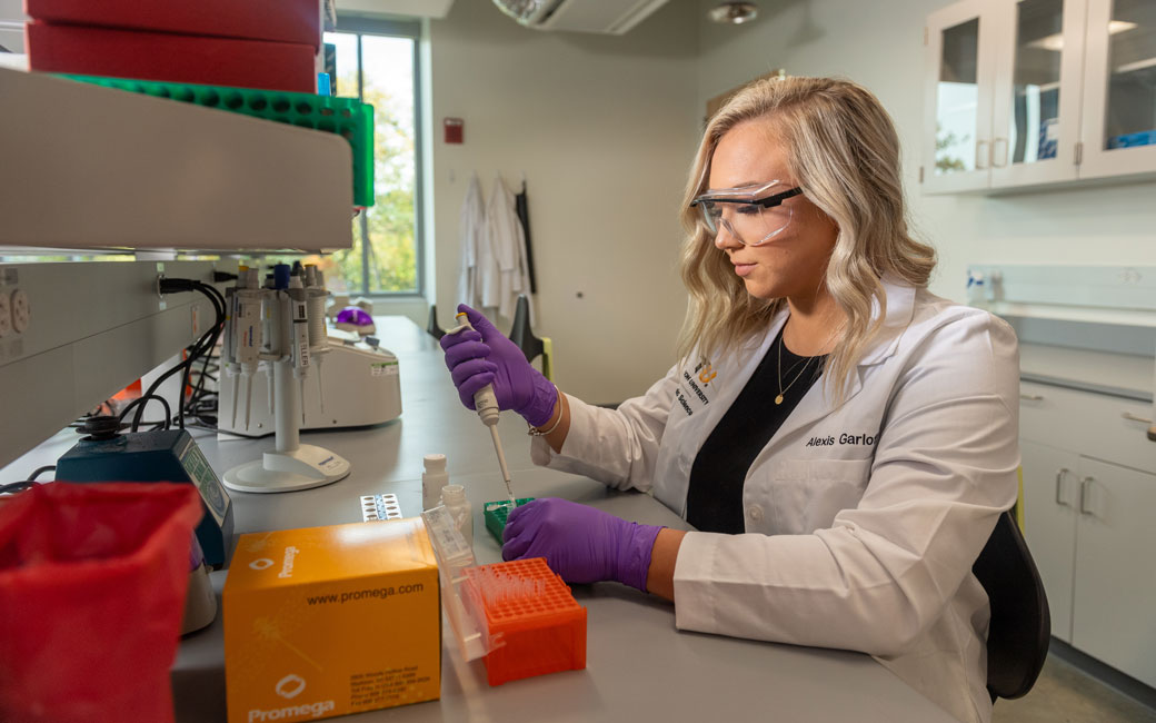 Alexis Garloff '22 performs lab work in the TU Human Remains Lab