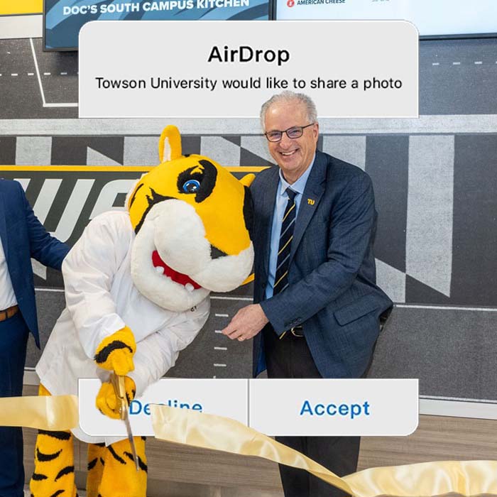 an airdropped photo request of President Ginsberg and Doc cutting a ribbon