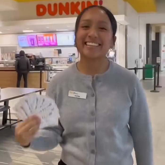 TU student holding gift cards