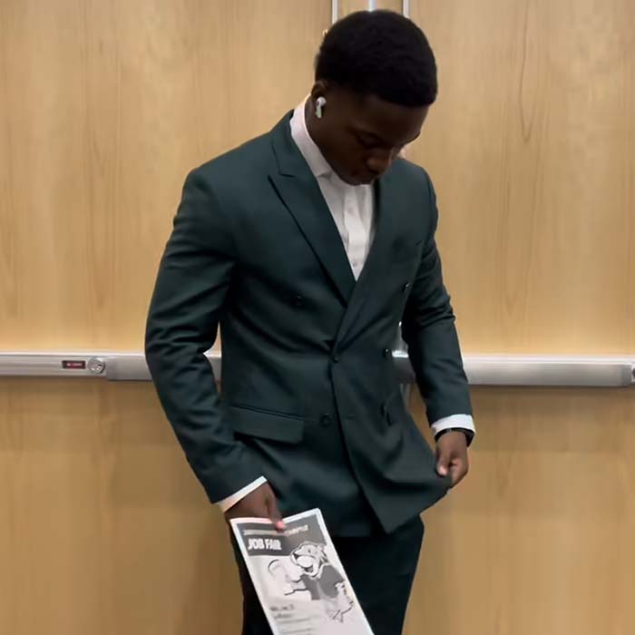 student in a suit