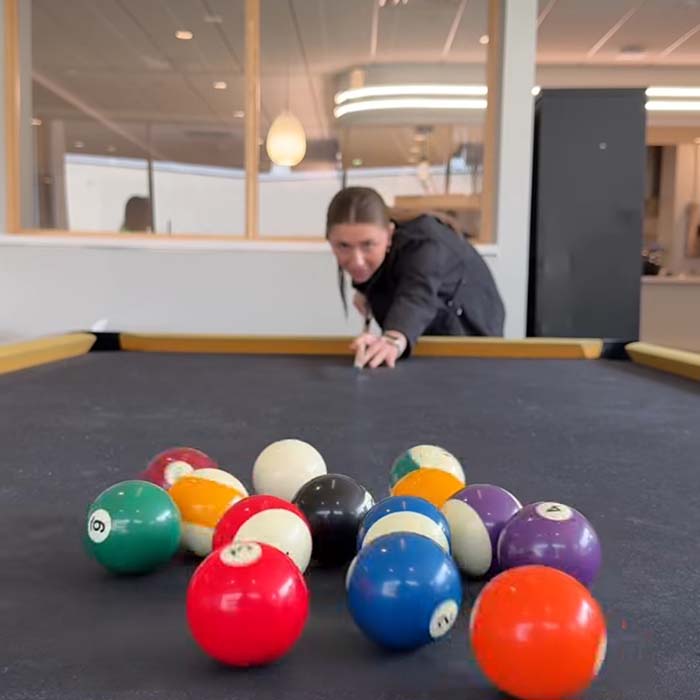 TU student playing pool