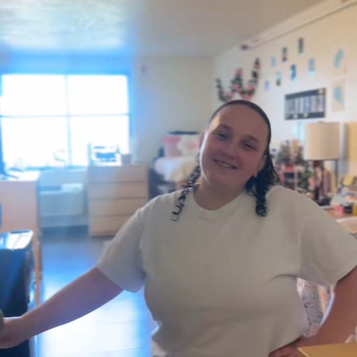 TU student, Savannah, in her dorm room