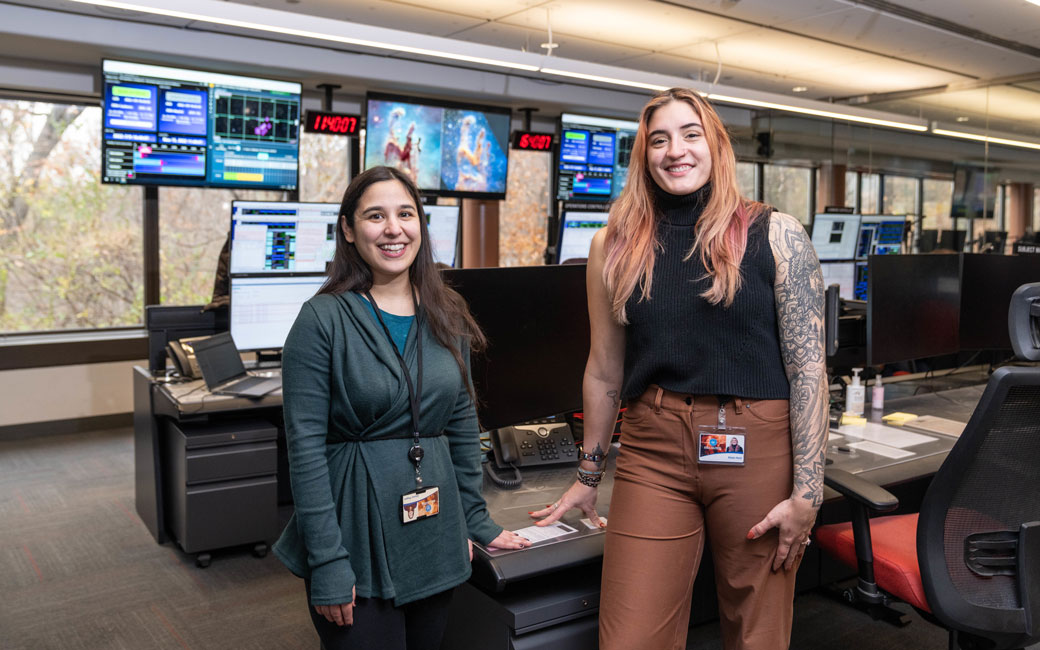 Alyssa Pagan and Kielan Hoch inside the James Webb Space Telecope Control Center