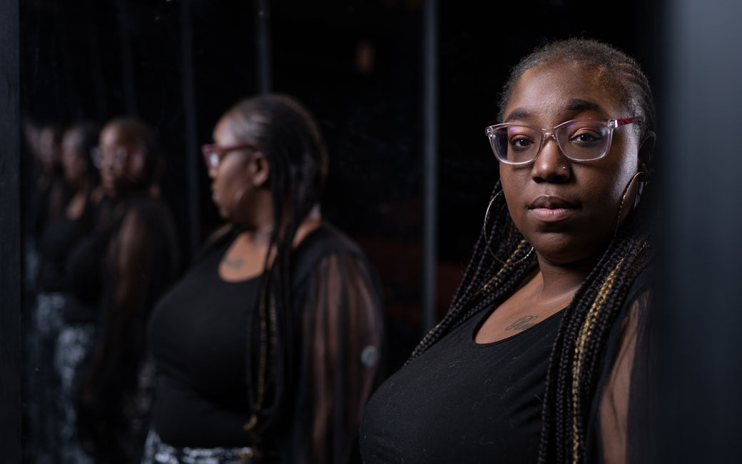 Lakeshia Ferebee staring into a mirror