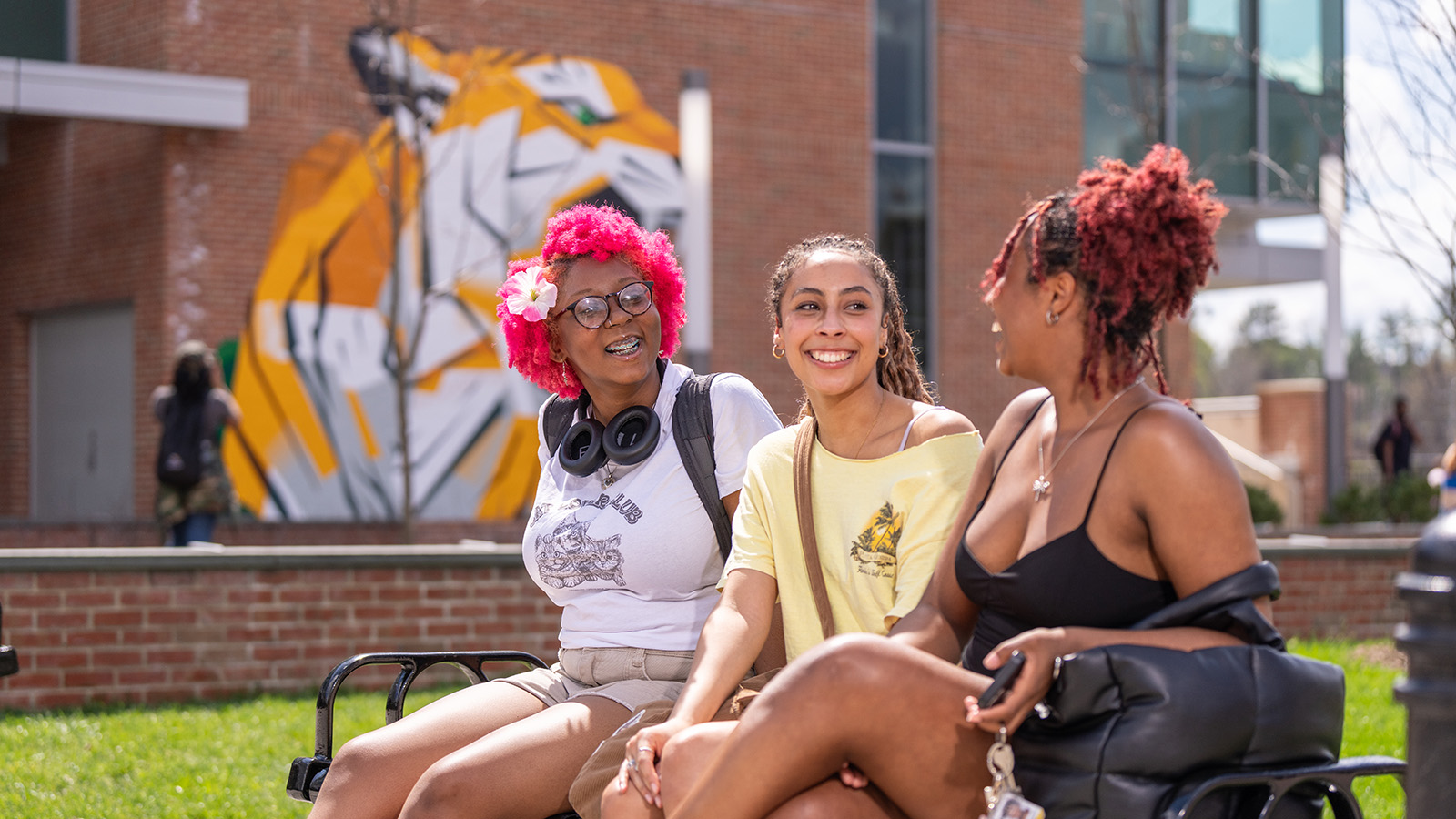 Three students sitting