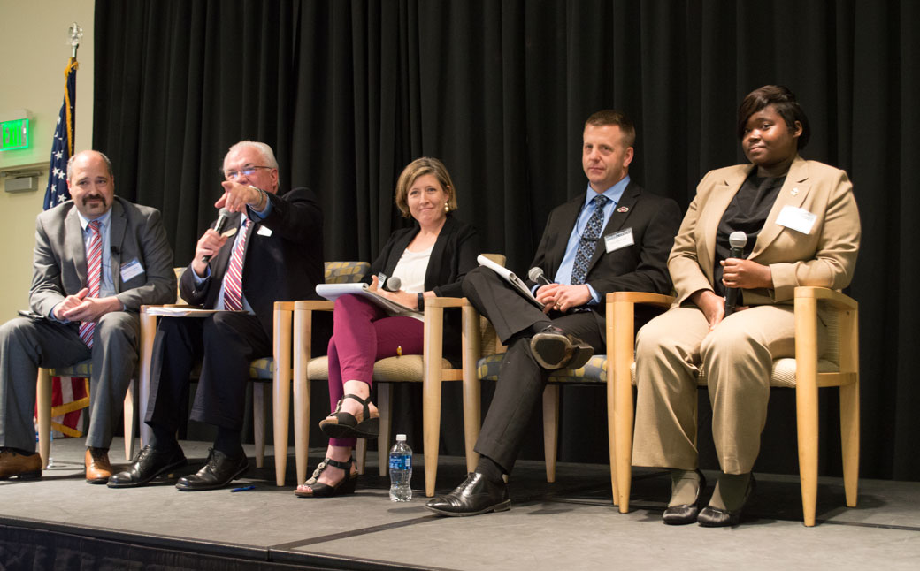 Panelists discuss new initiatives and partnerships that businesses and higher education institutions are taking to provide educational opportunities and prepare individuals for careers. The panel took place during the Maryland Workforce Outlook Forum, hosted at Towson University on May 17. 
