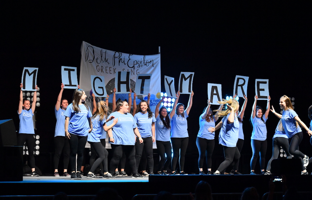 The sisters of Delta Phi Epsilon during 2018 Greek Sing.