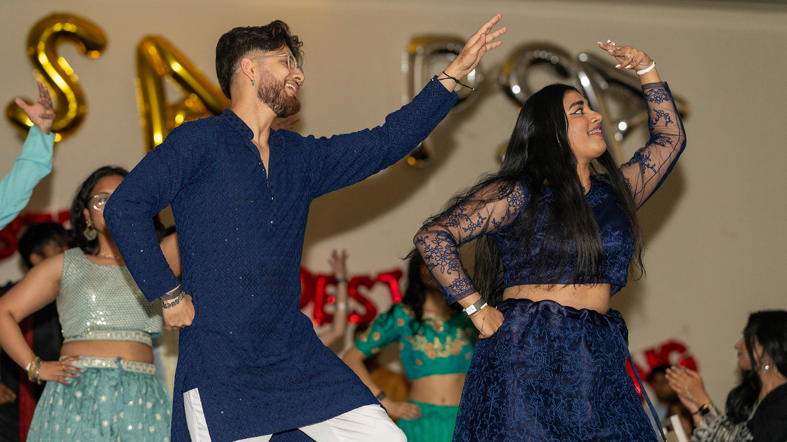 students dancing at sasa's my big fat desi wedding