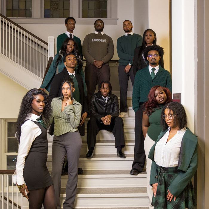 Adjoyi and his fellow executive board members of Money and Minorities pose for a team picture