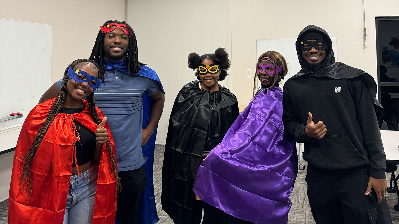 People in superhero costumes